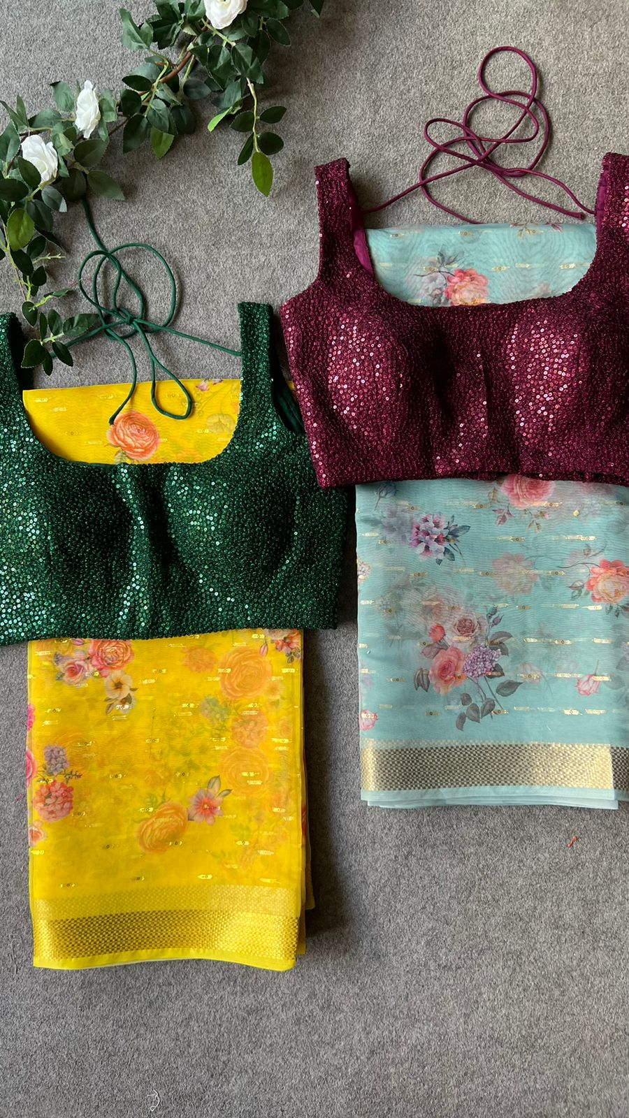 Yellow organza saree with green sequins blouse