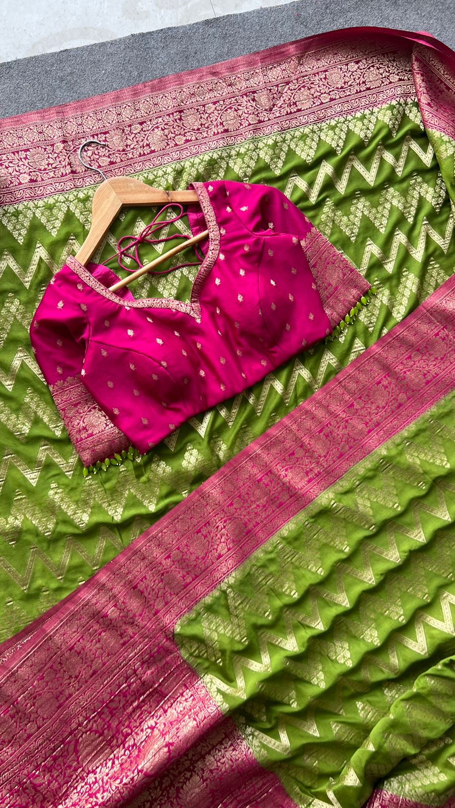 Parrot Green georgette banarasi saree with pink hand worked blouse