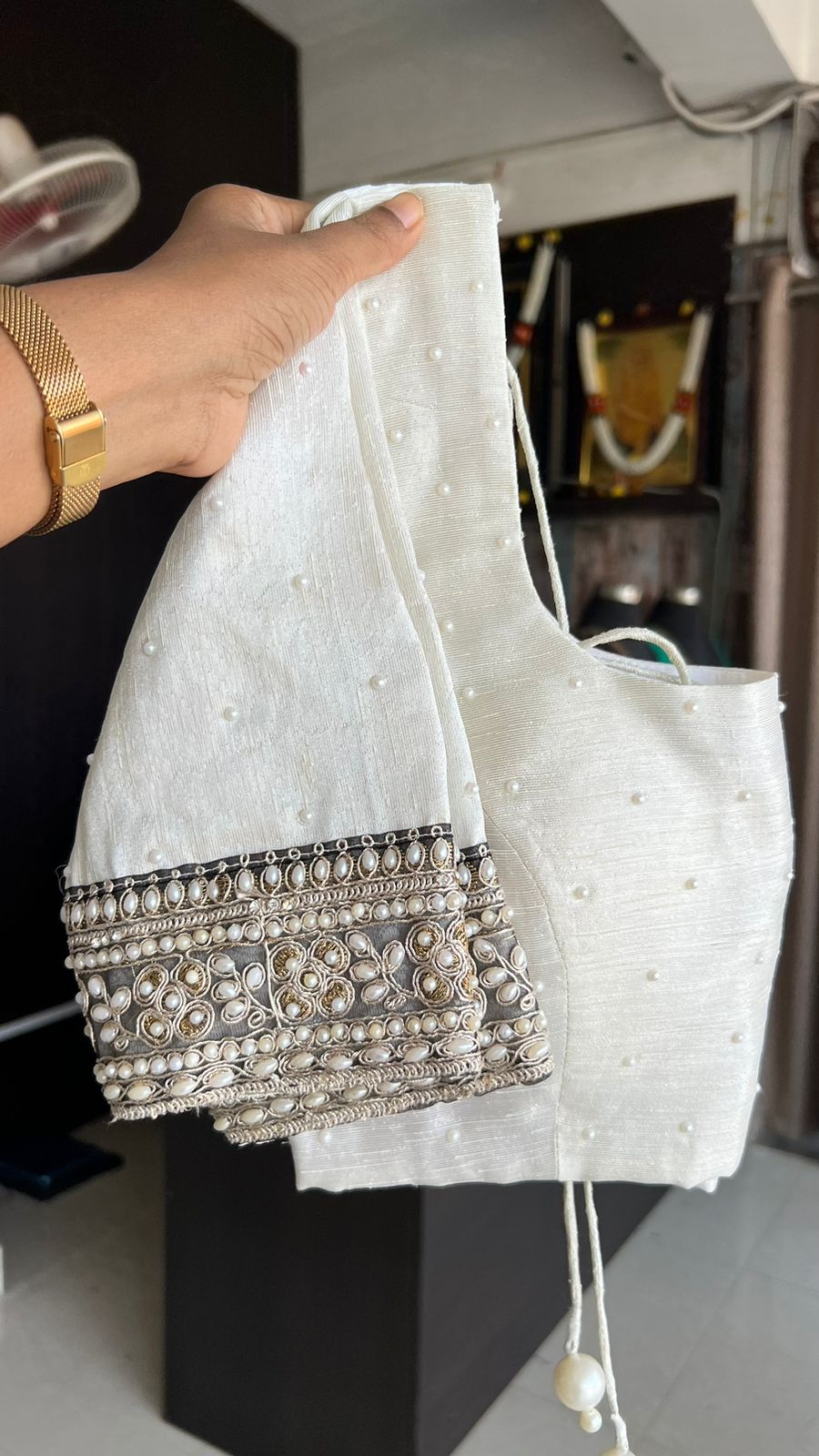 Black georgette lehariya saree with pearl handwork blouse
