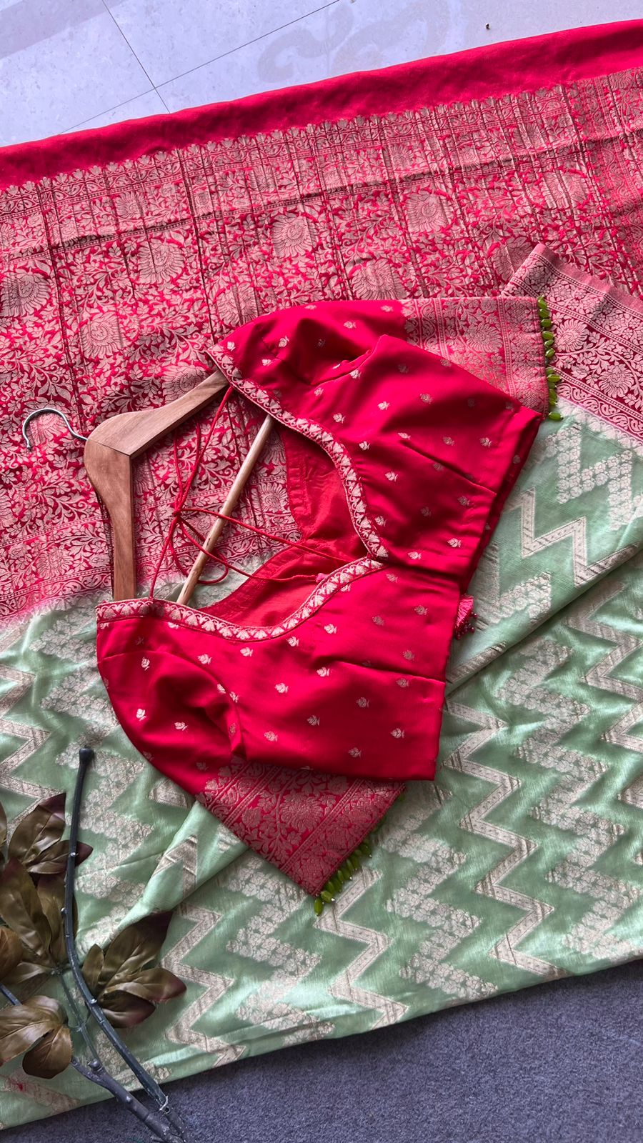 Mint Green georgette banarasi saree with red hand worked blouse