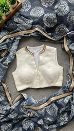 Grey chiffon printed saree with white hand work blouse