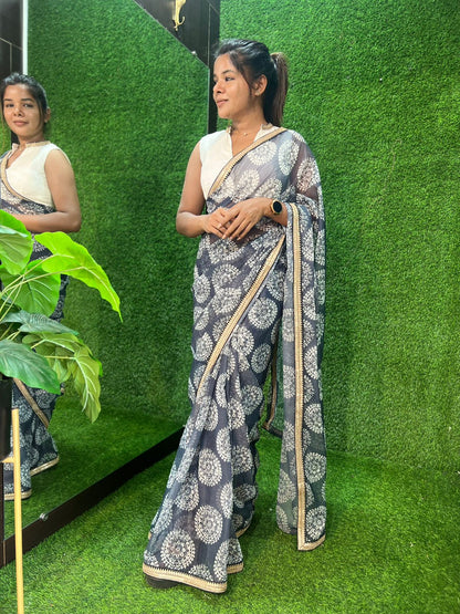 Grey chiffon printed saree with white hand work blouse