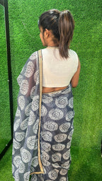 Grey chiffon printed saree with white hand work blouse