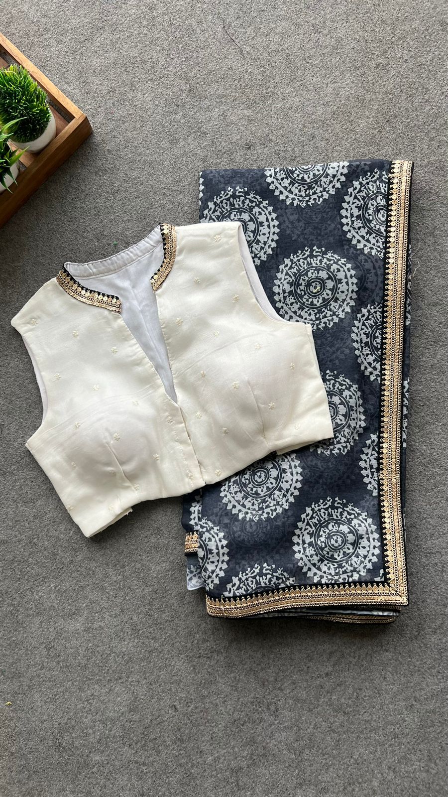 Grey chiffon printed saree with white hand work blouse
