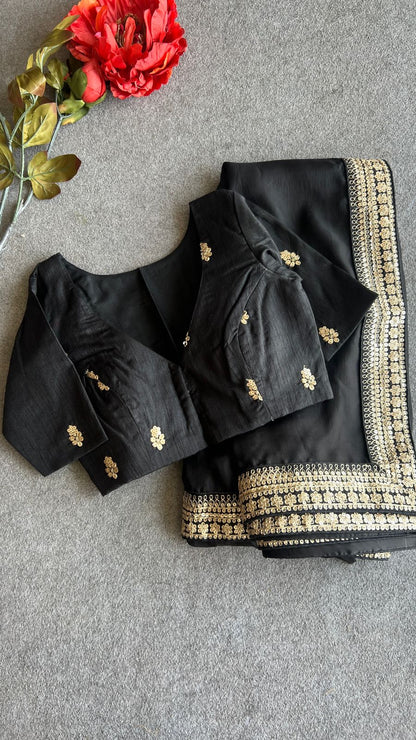 Black satin saree with embroidery blouse