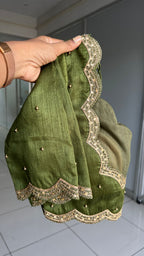 Green floral organza saree with mehandi embroidered blouse