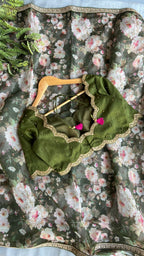 Green floral organza saree with mehandi embroidered blouse