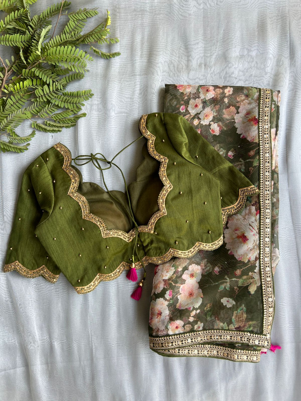 Green floral organza saree with mehandi embroidered blouse