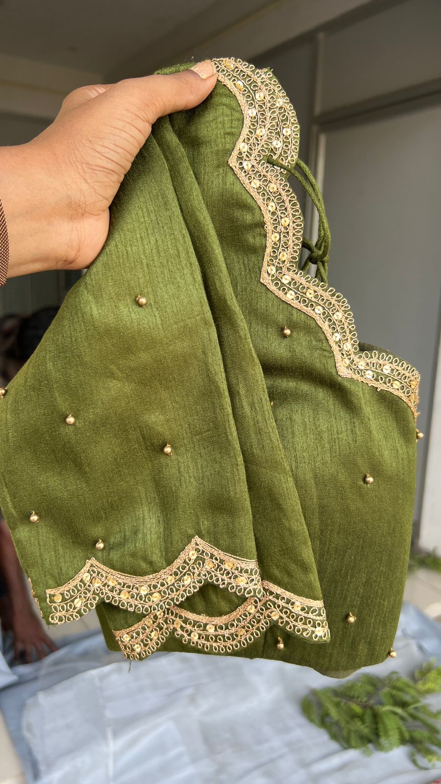 Green floral organza saree with mehandi embroidered blouse