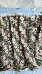 Green floral organza saree with mehandi embroidered blouse