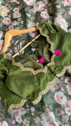 Green floral organza saree with mehandi embroidered blouse