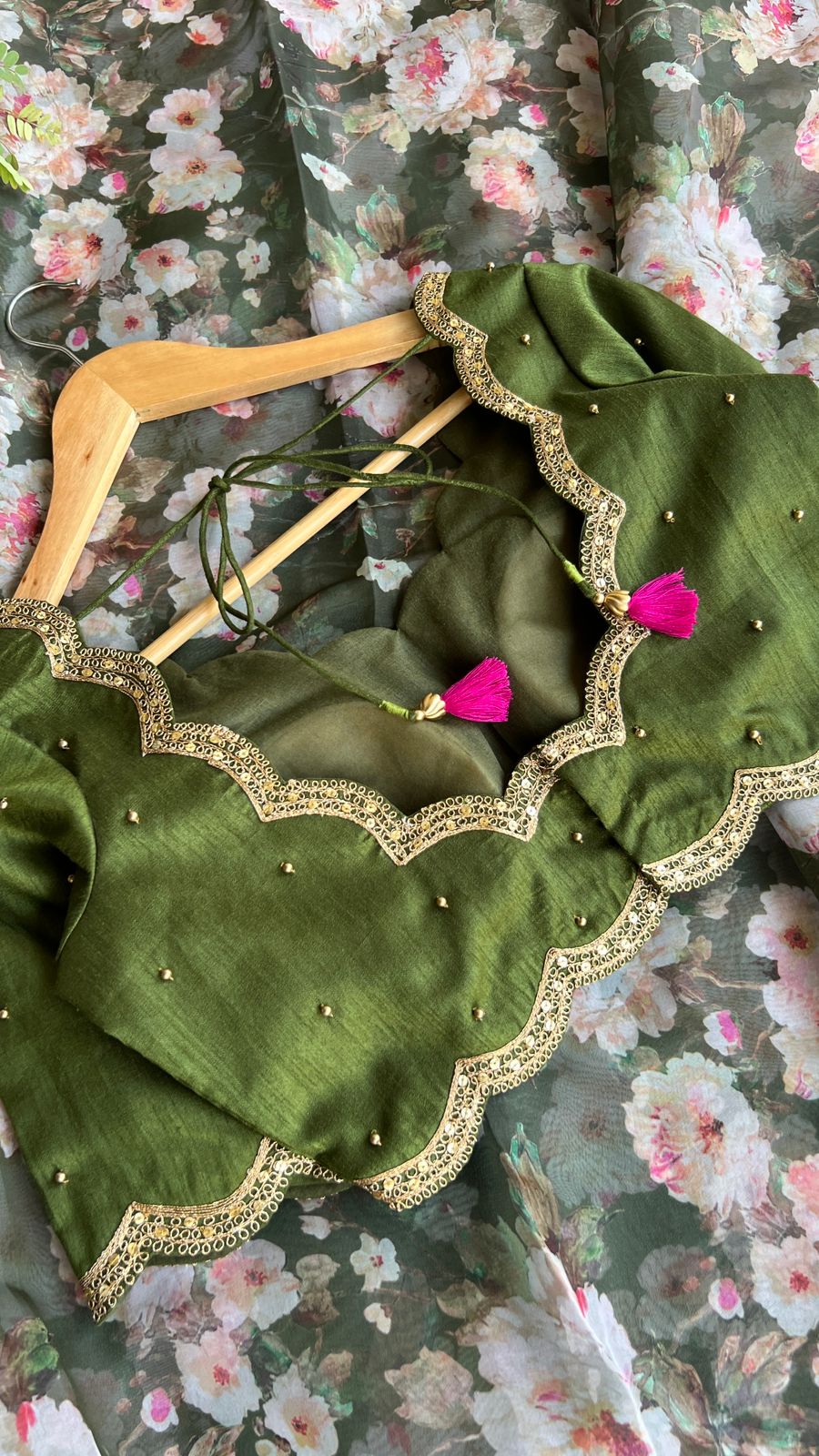 Green floral organza saree with mehandi embroidered blouse
