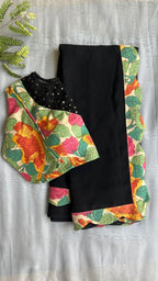 Black georgette saree with floral cotton blouse