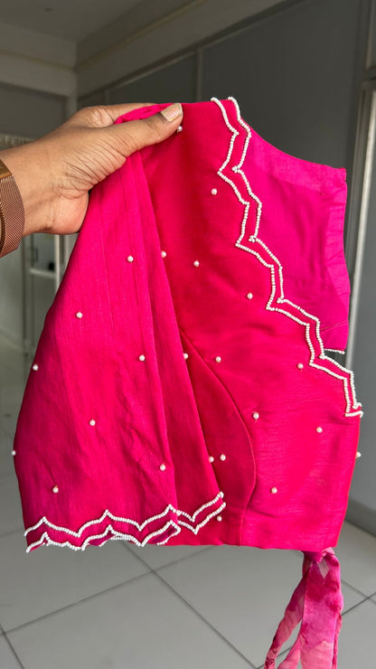 Pink floral organza saree with pearl hand work blouse