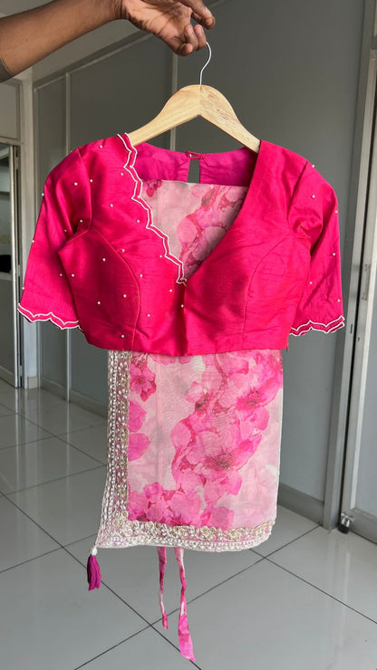 Pink floral organza saree with pearl hand work blouse