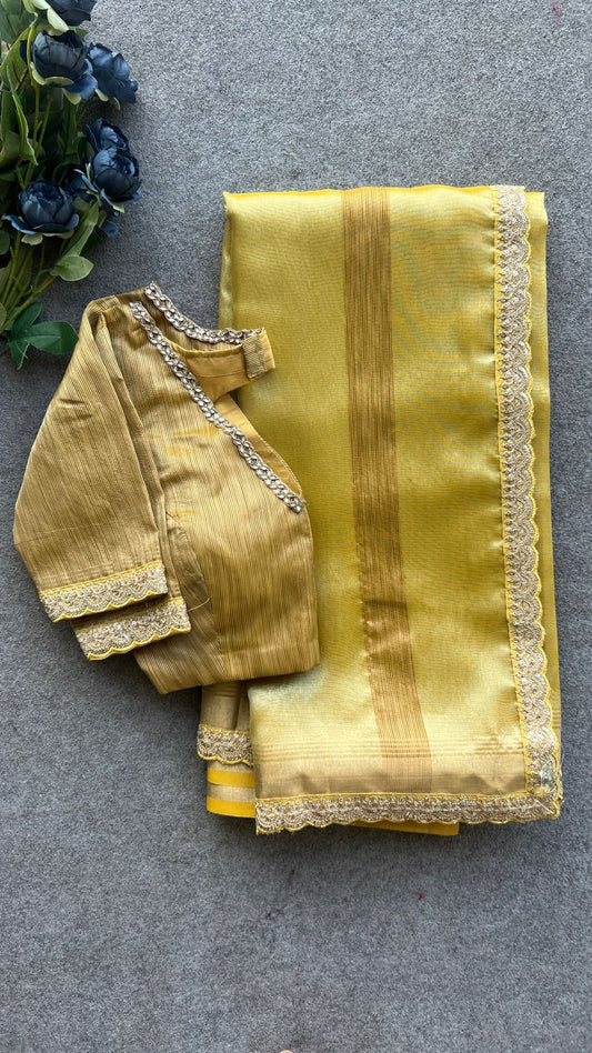 Yellow glass tissue saree with  hand work blouse