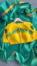 Rama green tissue saree with embroidery work blouse