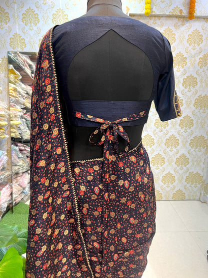 Blue floral biini silk saree with hand work blouse