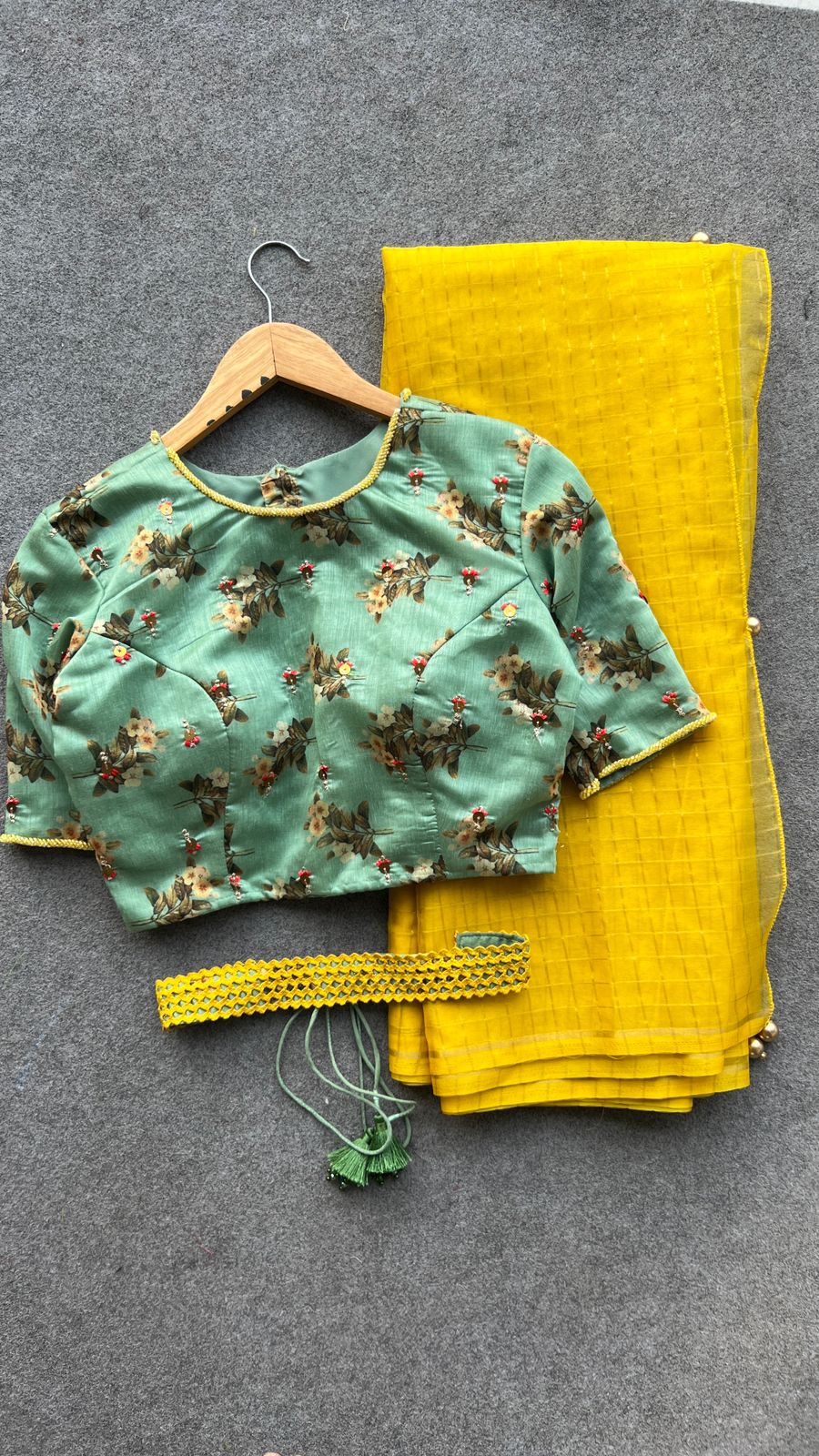Yellow checked organza saree with hand work blouse