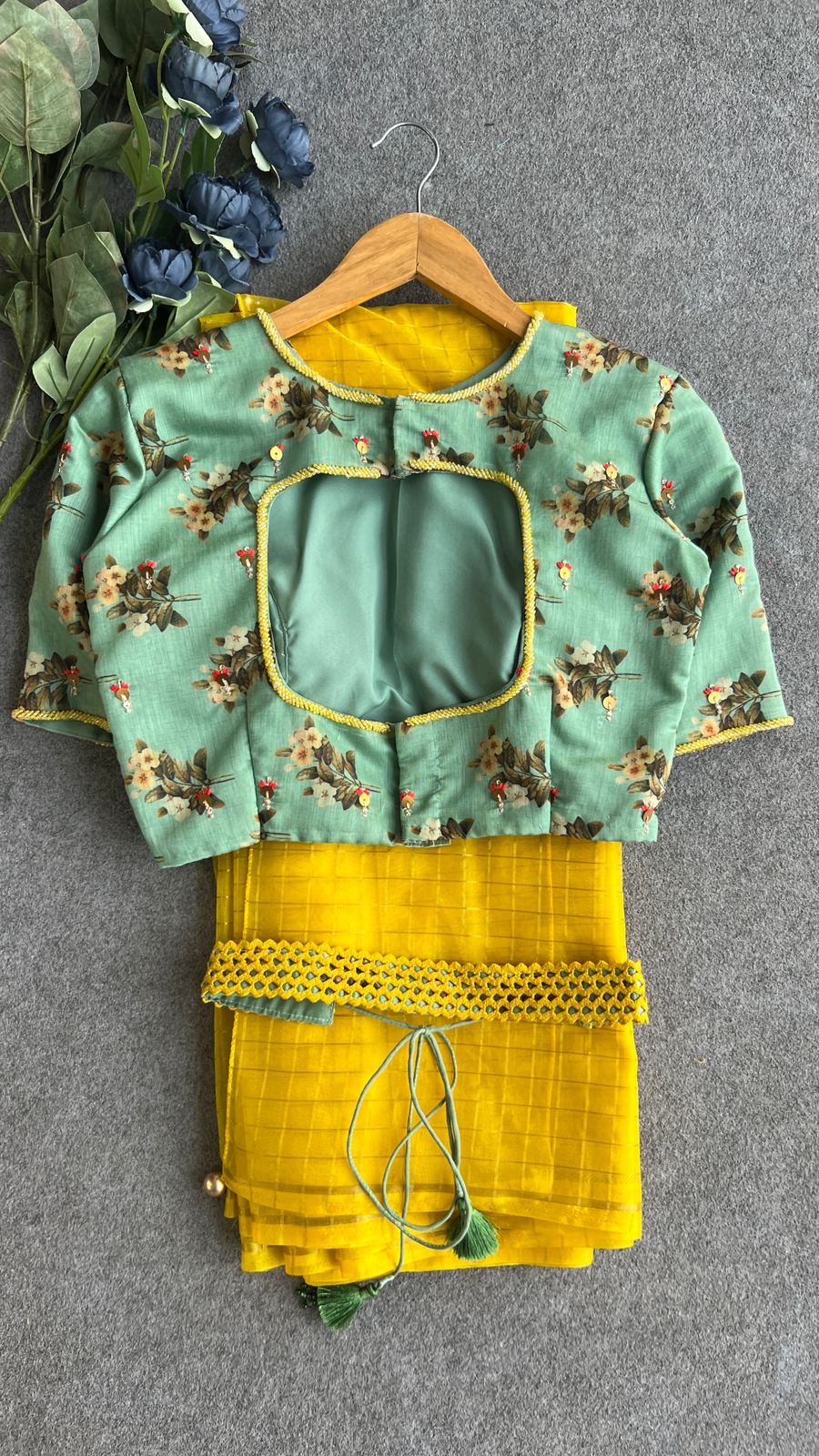 Yellow checked organza saree with hand work blouse