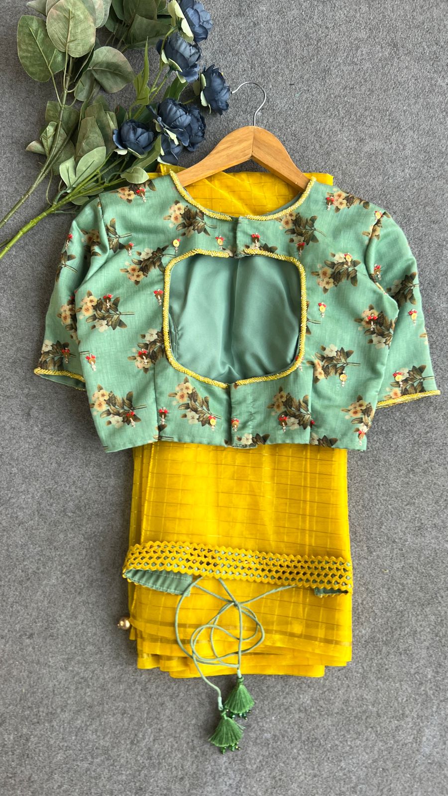 Yellow checked organza saree with hand work blouse