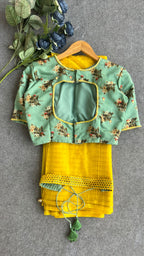 Yellow checked organza saree with hand work blouse