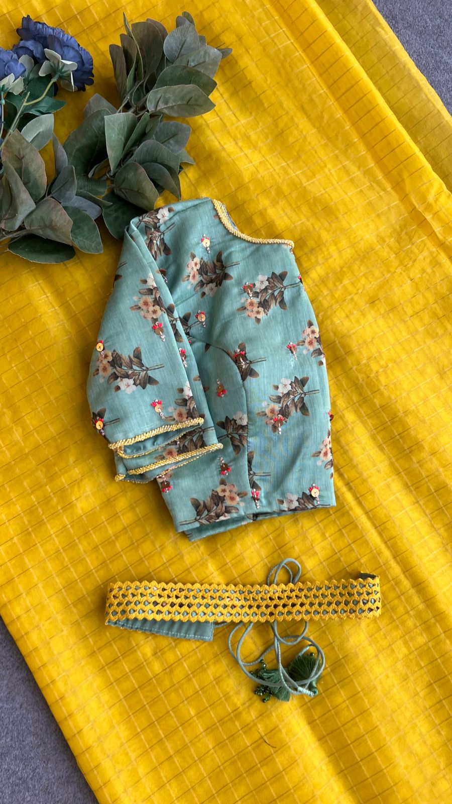 Yellow checked organza saree with hand work blouse
