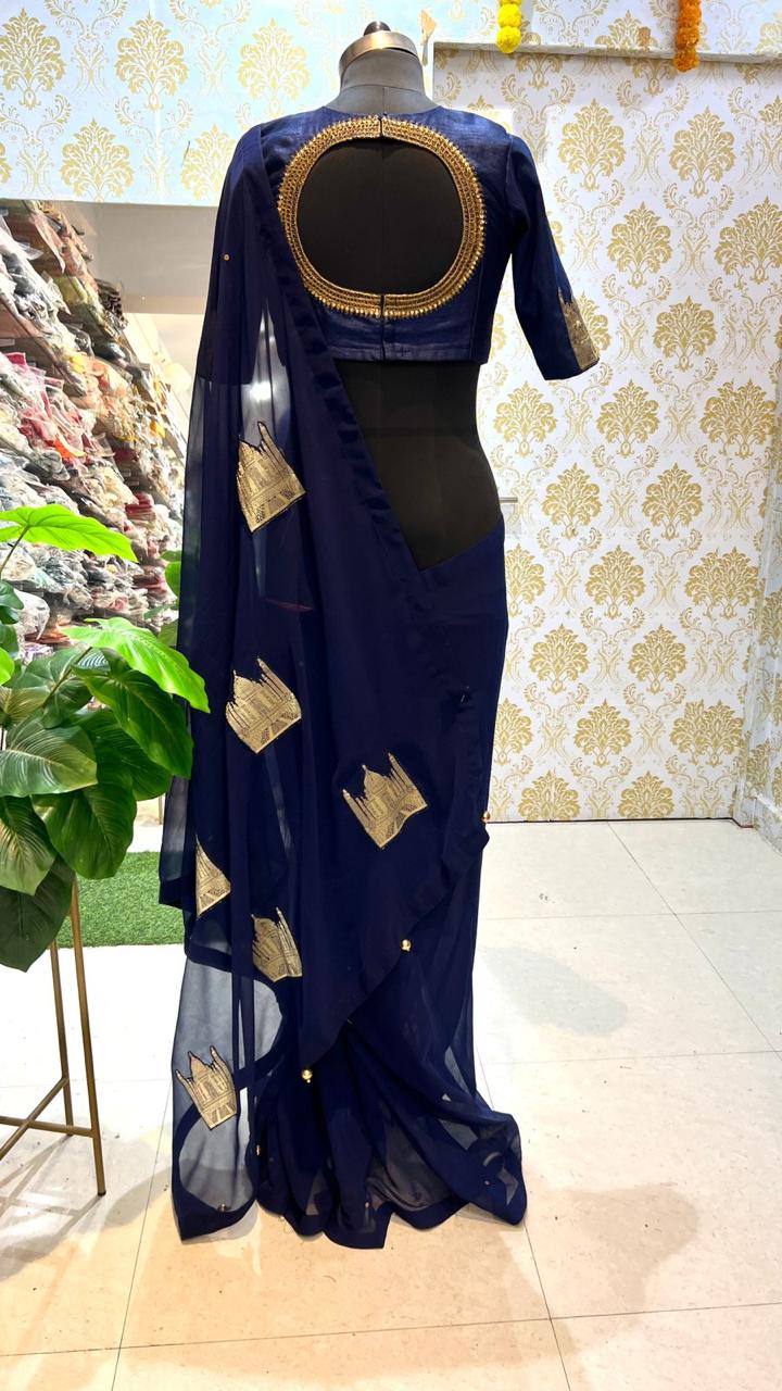 Blue georgette saree with taj embroidery work blouse