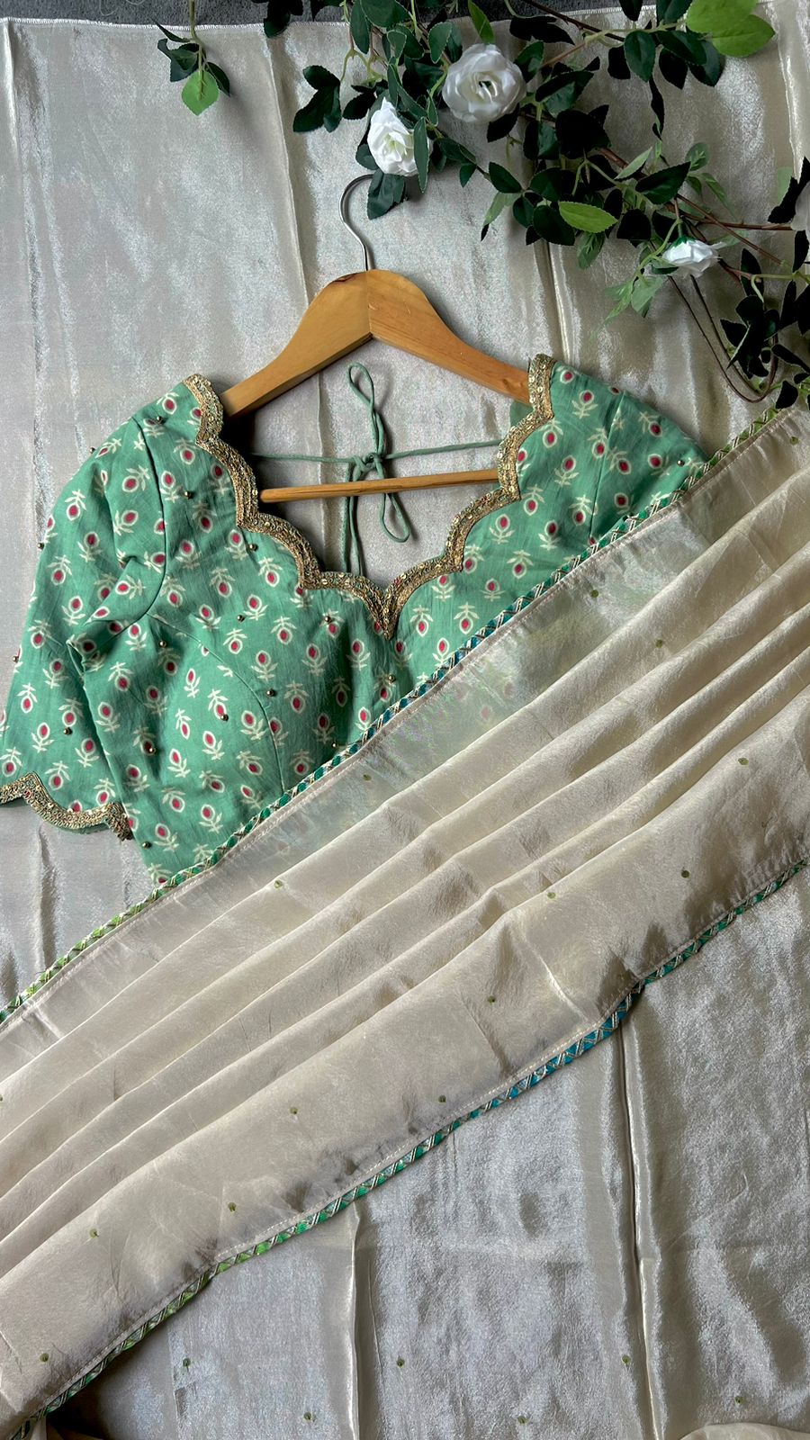 Beige silk designer saree with pista green embroidered blouse