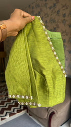 Green soft organza saree with hand worked blouse