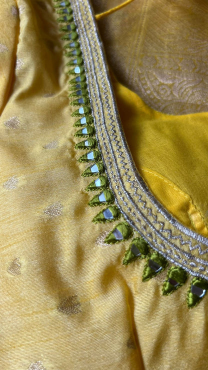 Yellow organza floral designer saree with mirror embroidery blouse