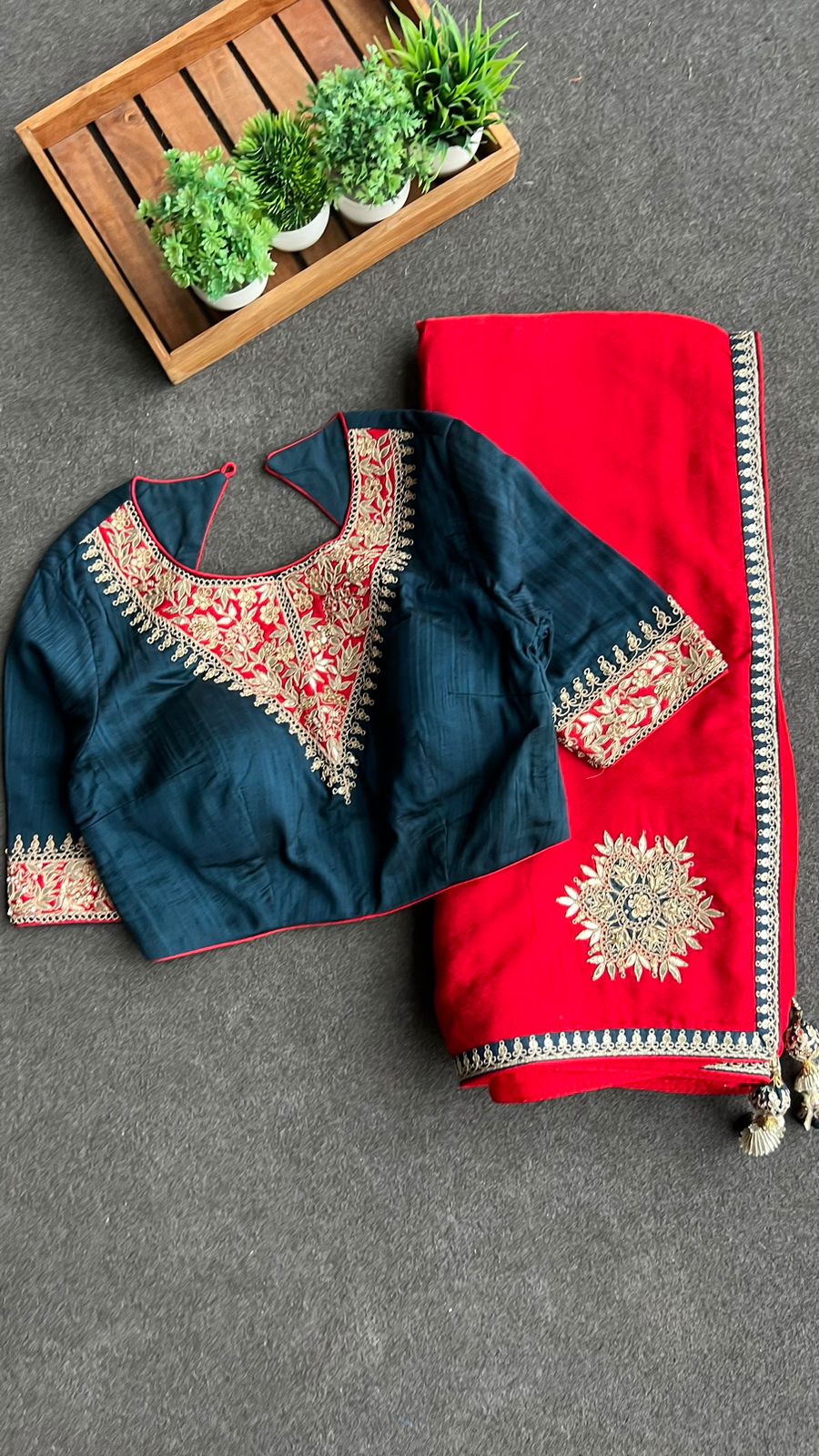 Red textured silk saree with heavy embroidery blouse
