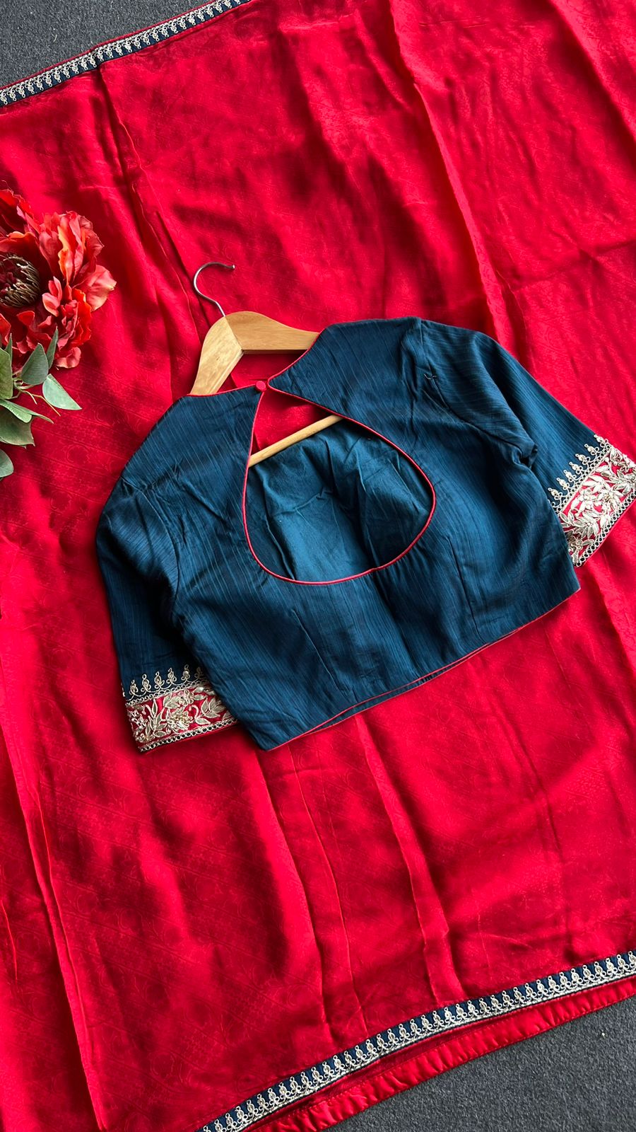Red textured silk saree with heavy embroidery blouse