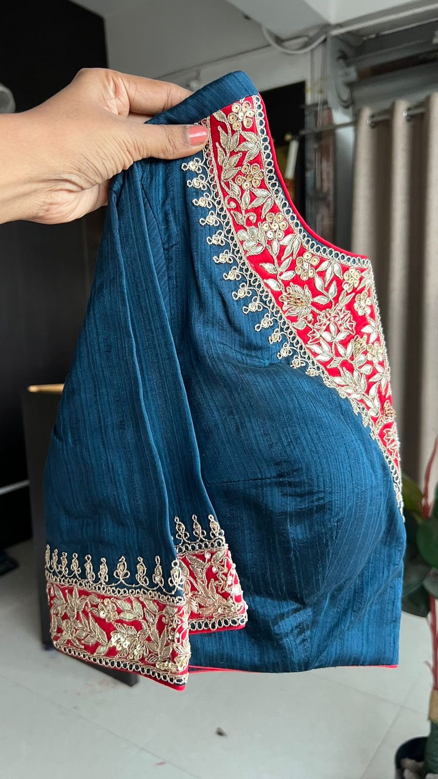 Red textured silk saree with heavy embroidery blouse