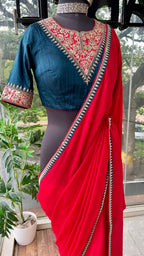 Red textured silk saree with heavy embroidery blouse