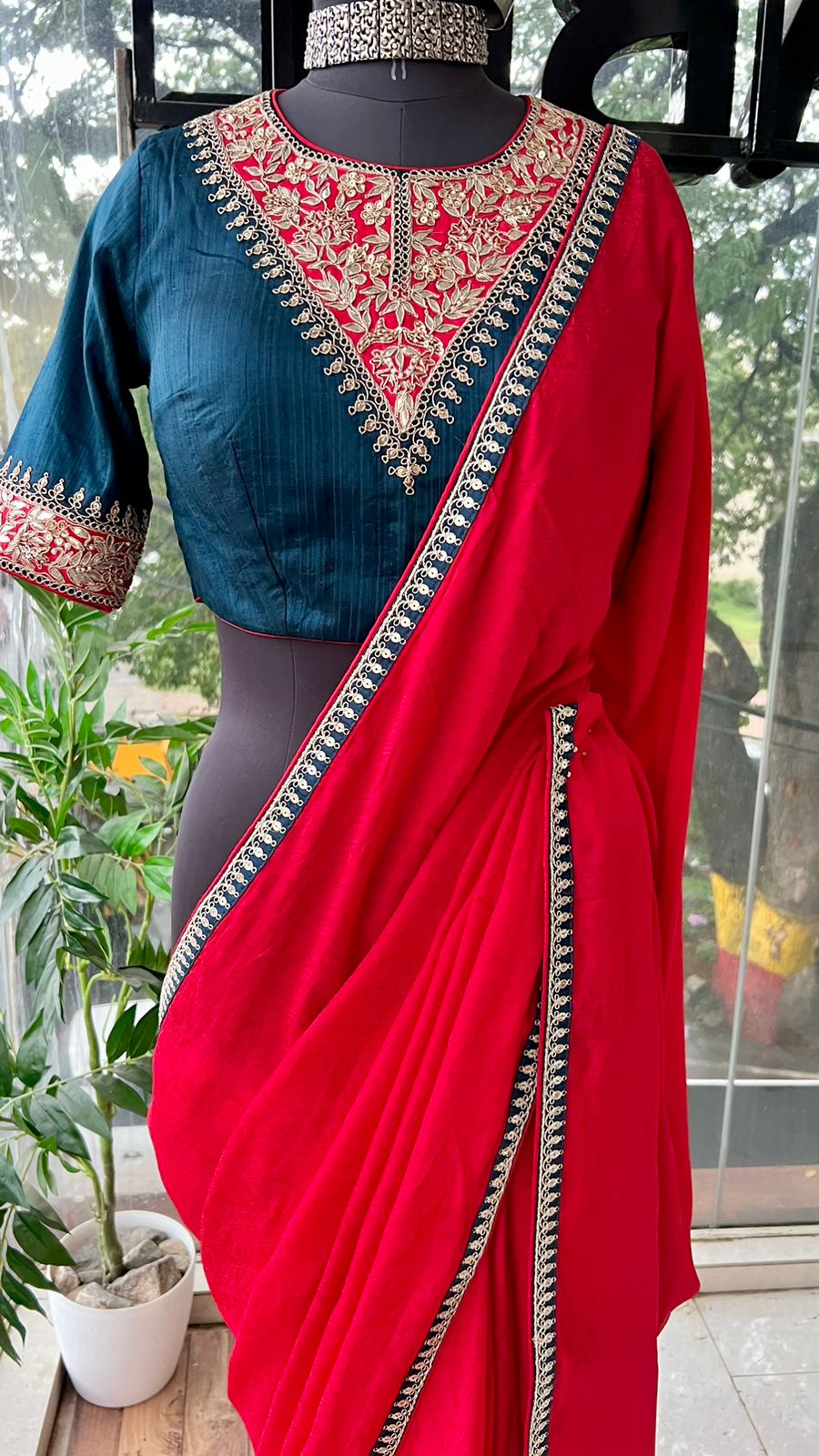 Red textured silk saree with heavy embroidery blouse