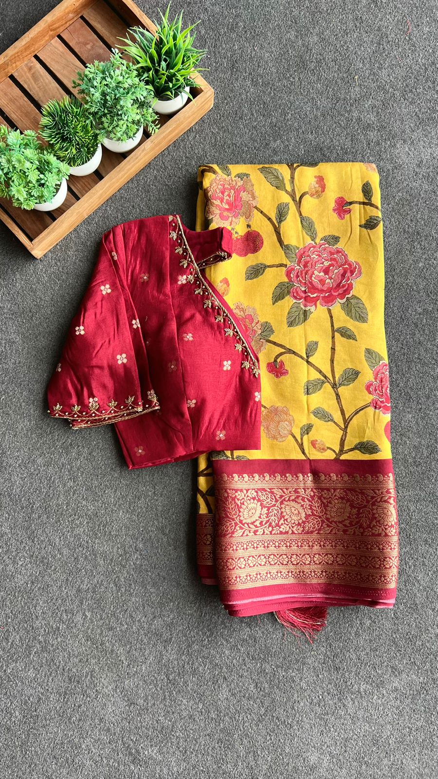 Yellow silk printed saree with hand worked blouse