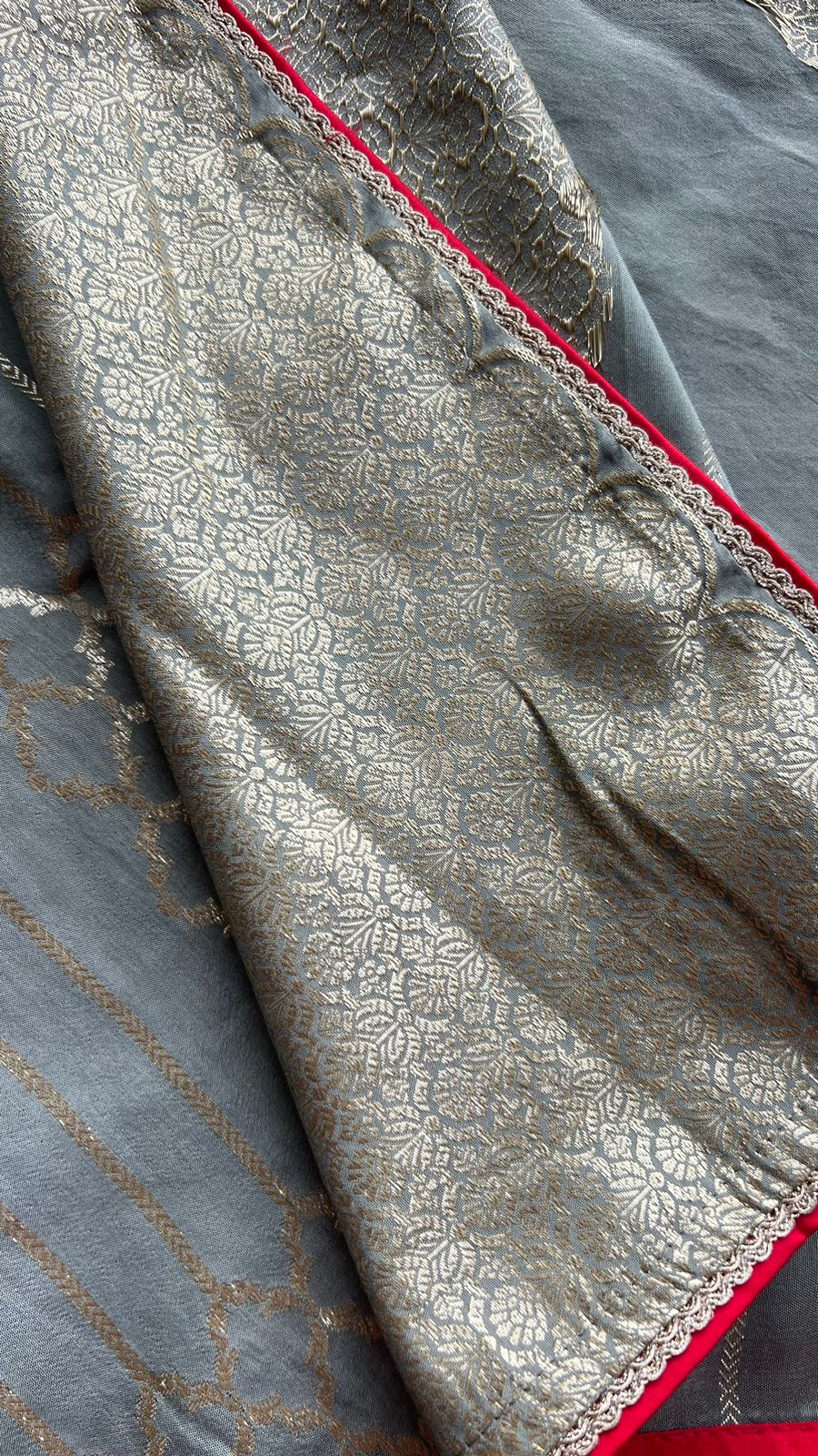 Grey silk saree with red heavy embroidery blouse