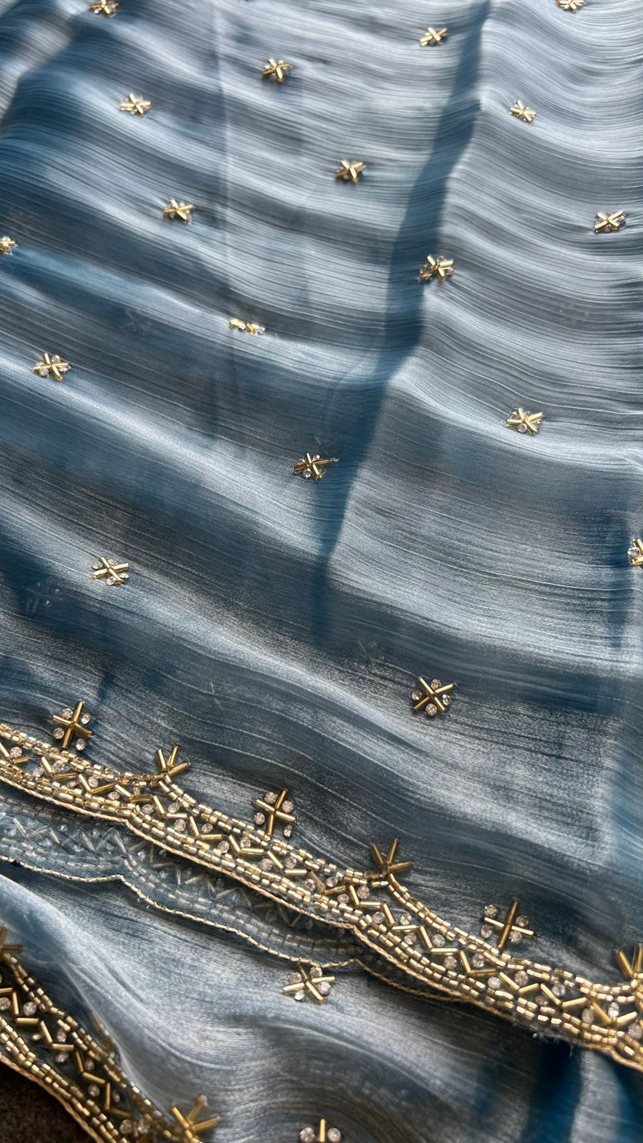 Aqua blue shimmer silk saree with hand worked blouse