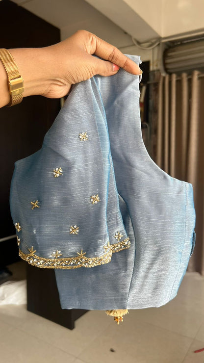 Aqua blue shimmer silk saree with hand worked blouse