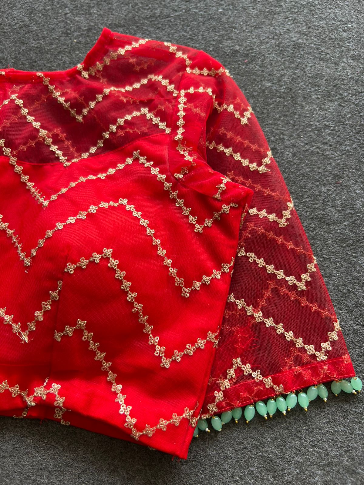 Red sequins embroidery netted blouse