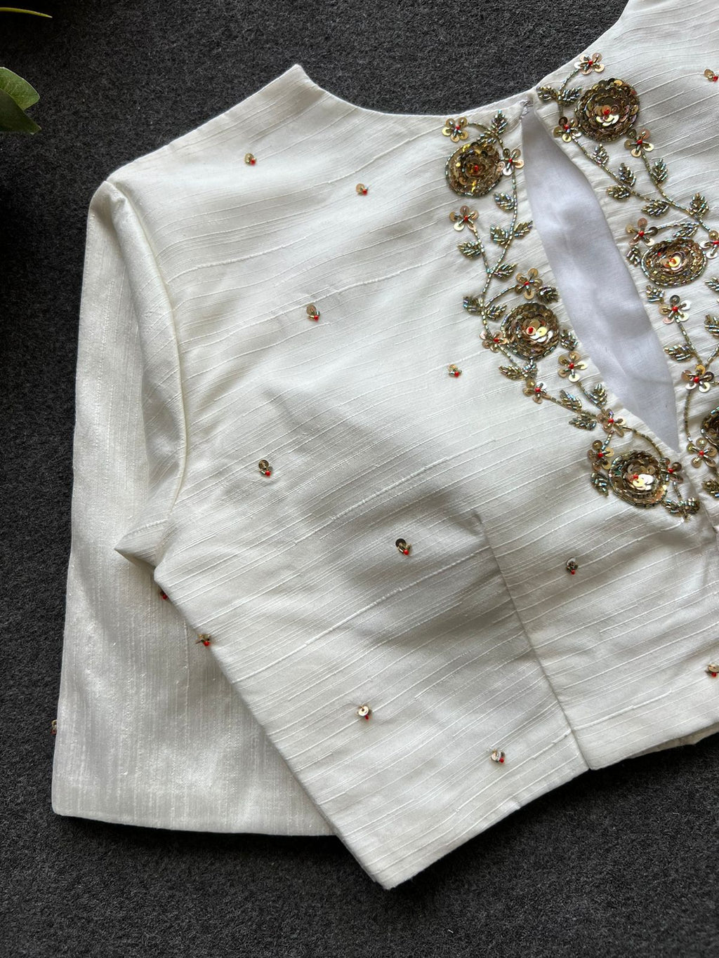 Half white silk intricate back hand work blouse