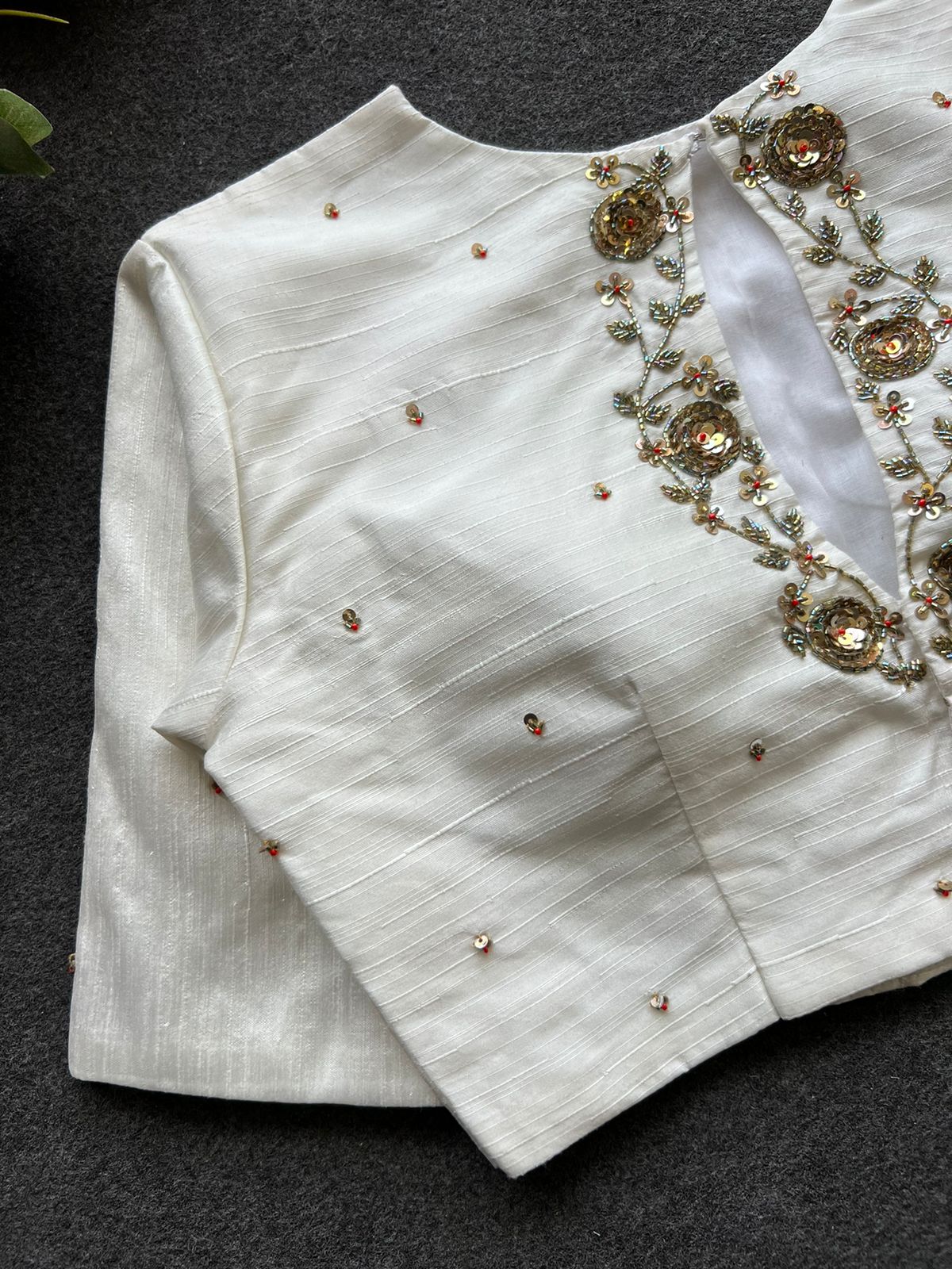 Half white silk intricate back hand work blouse