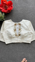 Half white silk intricate back hand work blouse