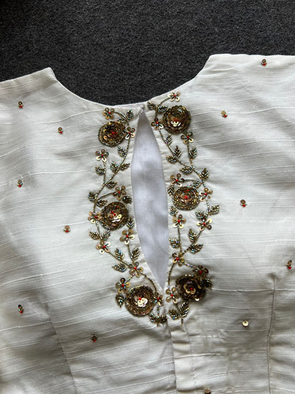 Half white silk intricate back hand work blouse