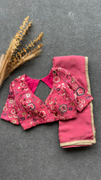 Deep pink organza saree with embroidered blouse