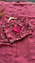 Deep pink organza saree with embroidered blouse