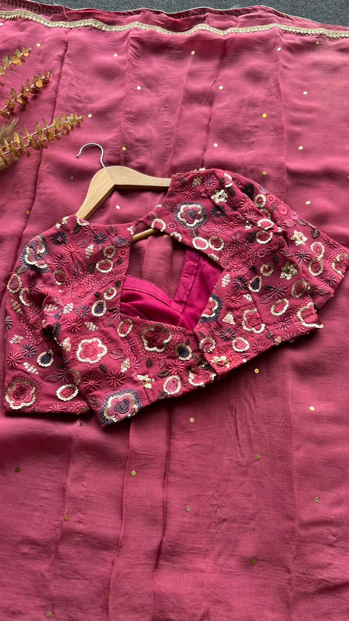 Deep pink organza saree with embroidered blouse