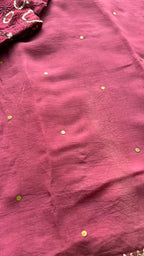 Deep pink organza saree with embroidered blouse
