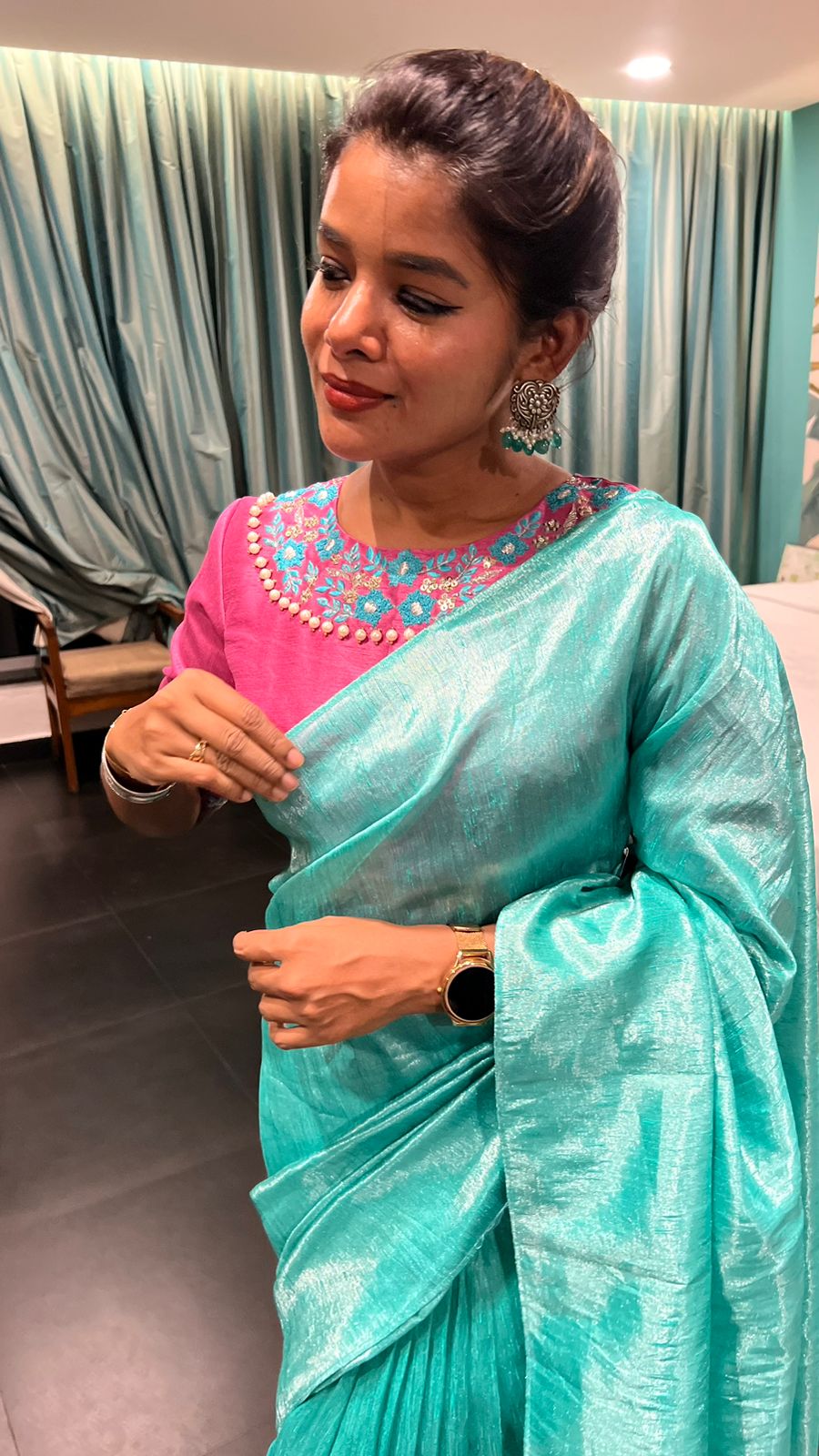 Soft blue tissue saree with pink hand embroidered blouse